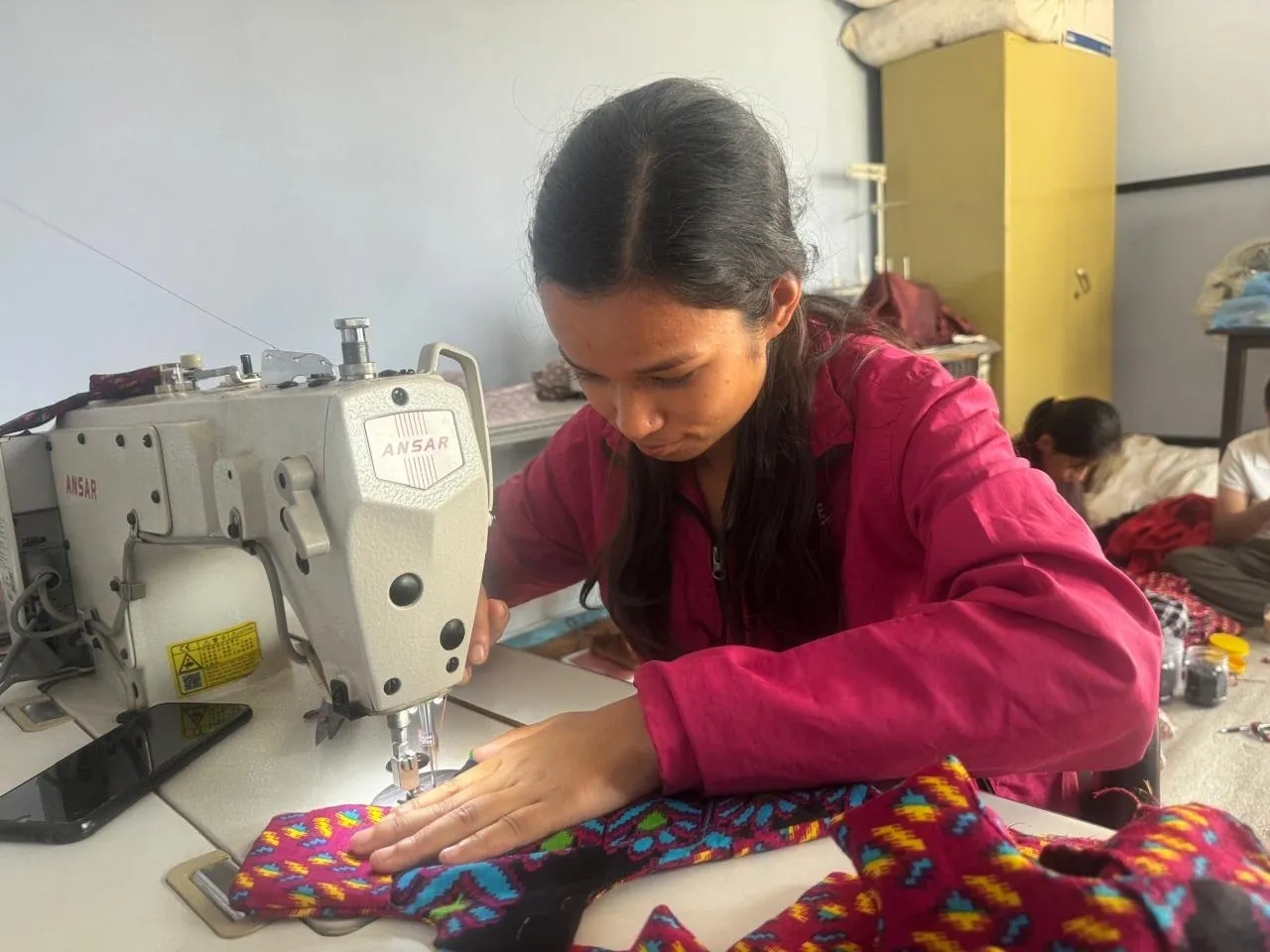 Pramila at work at Lily's Leaves